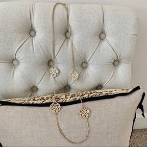 Gold tone medallion necklace